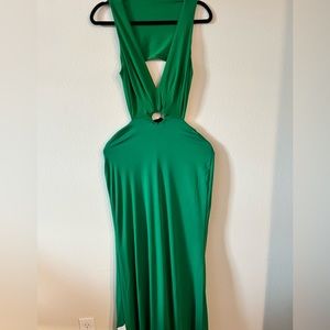 This Betsy Adam dress is a nice green color which is a US Size:6
